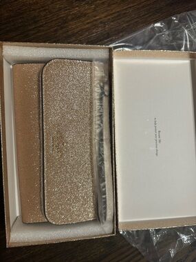 kate spade Rose Gold Glitter clutch/wristlet with Box. Brand new
